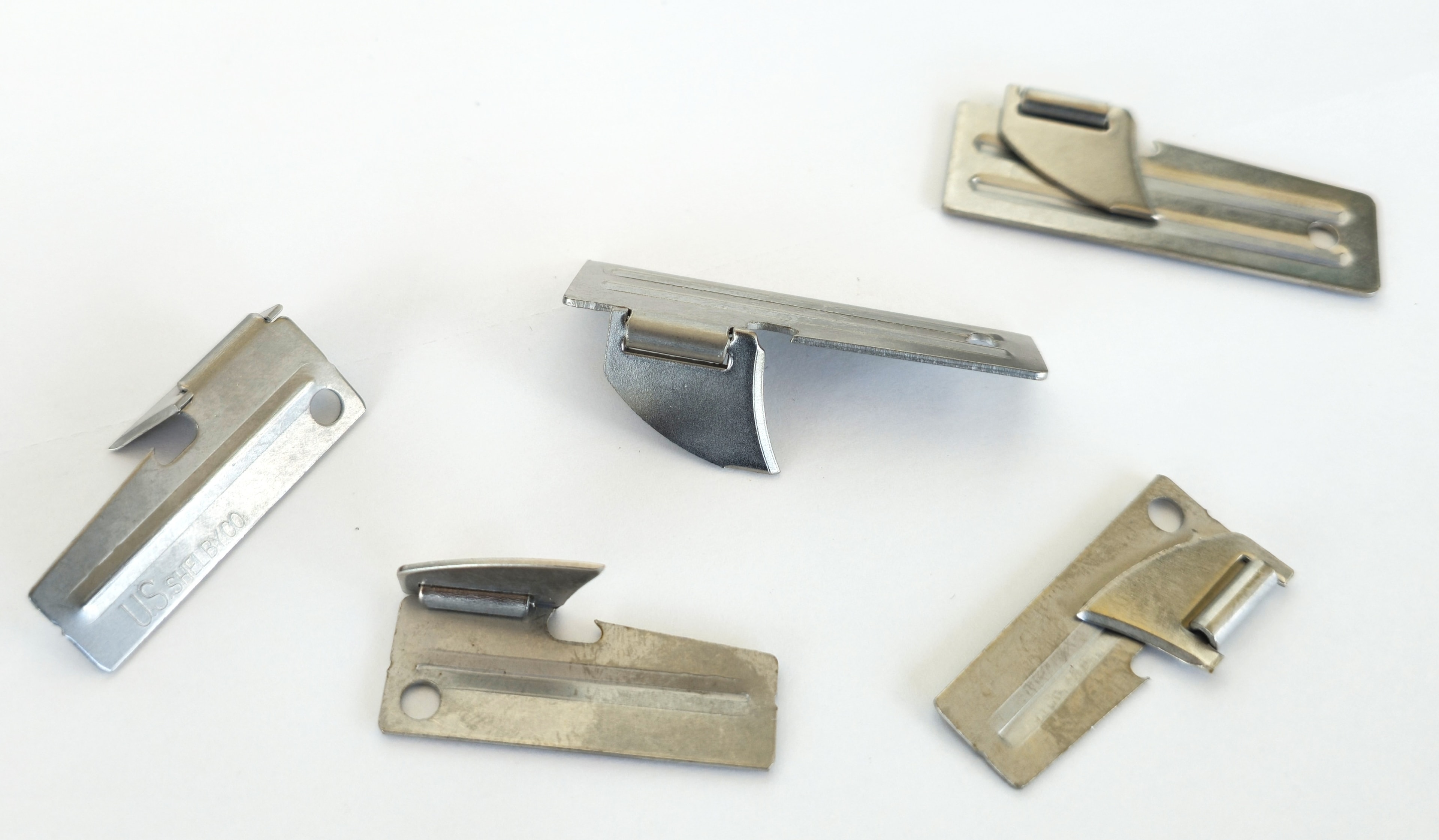 P38 and P51 military can openers — Happiness is a P38
