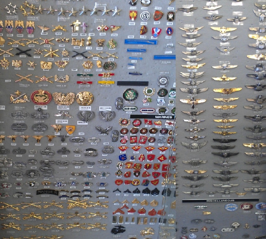 Sample pins and insignia in stock at Brigadoon Military Surplus